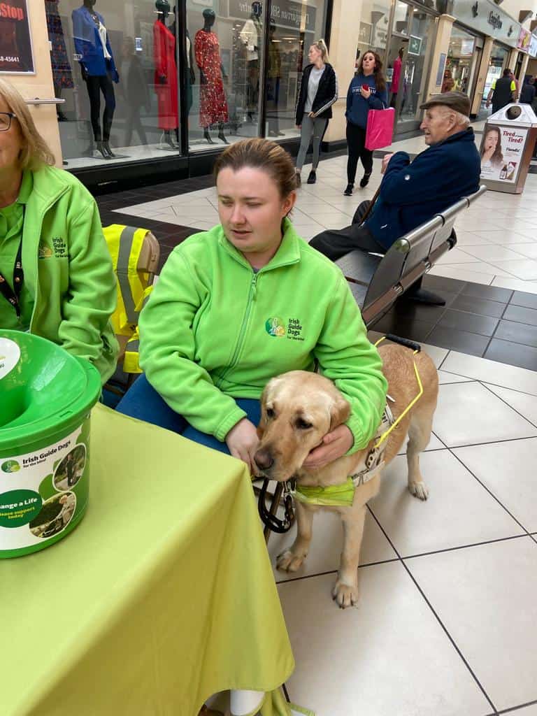 Photo of Shauna and her guide dog at a fundraising event for Irish Guide Dogs.