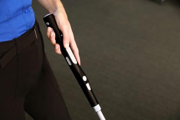 Image of hand holding Smart Cane 2